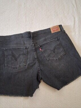 levis ♡ mid length black shorts 34